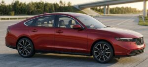 Full exterior view of the 2026 Honda Accord Refresh in a modern American setting