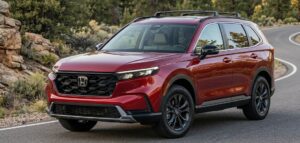 Front view of the 2026 Honda CR-V TrailSport Hybrid in a premium American setting
