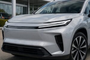 Close-up of 2027 Toyota Highlander EV inspired electric SUV front lighting and smooth EV nose design
