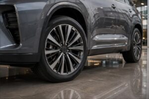Close-up of 2027 Toyota Highlander EV inspired SUV aerodynamic alloy wheels and all-season family tires